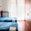 camera da letto doppia con letti singoli e armadio - Santa Chiara