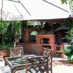 Tavolino esterno in legno e vimini - Giardino di Michela