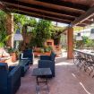 Zona relax e zona pranzo all'esterno - Giardino di Michela