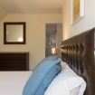Le pregiate rifiniture della camera da letto - Villa Castelforte