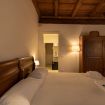 Camera da letto matrimoniale con spalliera - VeronaJourneys